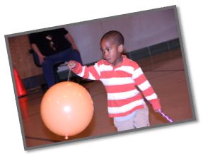 Boy playing with balloon 